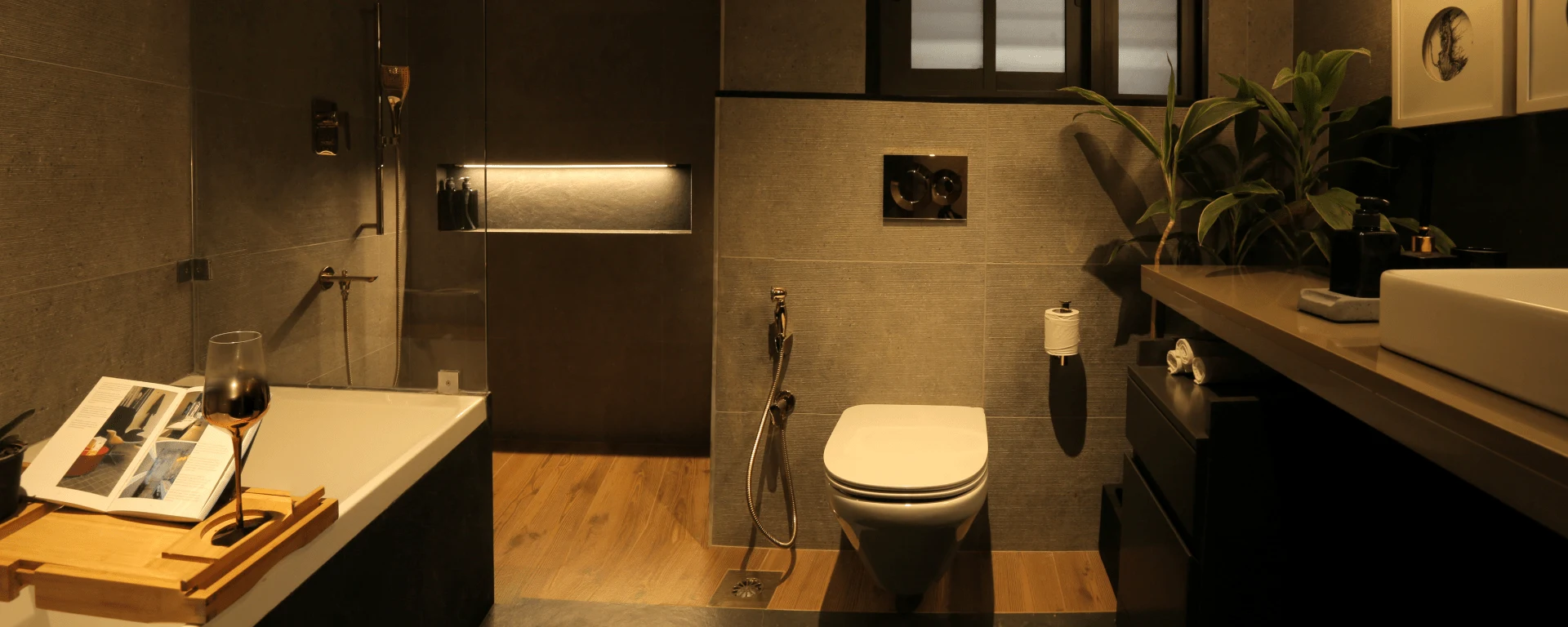 Cozy bathroom with bathtub and plants