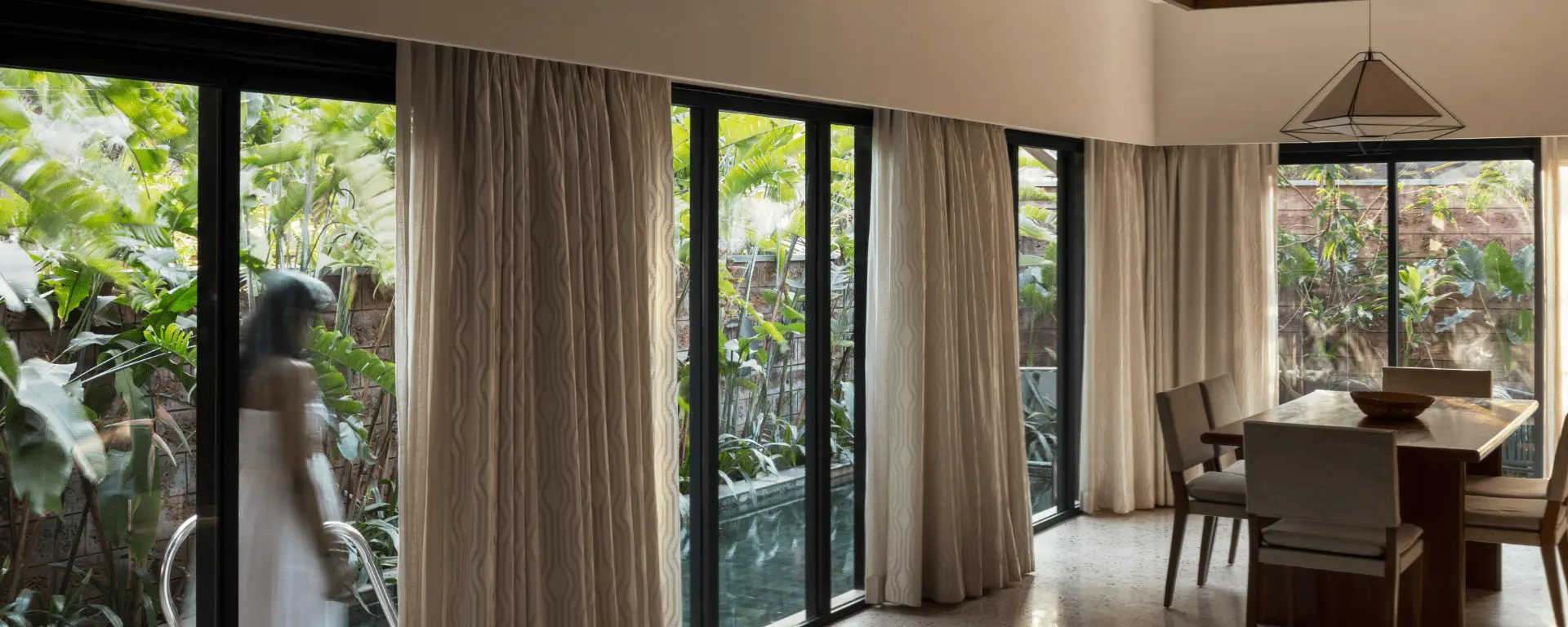 Bright dining room with tranquil greenery